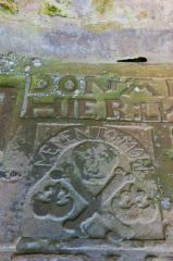 Skull and crossbones carving