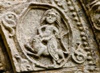 Barfreston, St Nicholas Church, Carved figure of a knight, south door