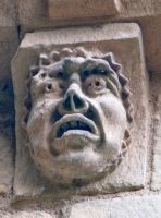 Barfreston, St Nicholas Church, Carved face 12
