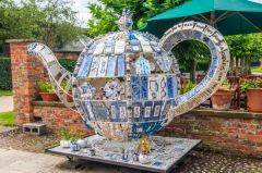 An unusual garden teapot ornament