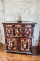 An Oriental marqutry cabinet