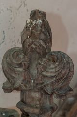 Medieval poppyhead bench end carving