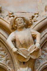 Medieval carving of a drummer