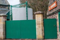 Gateway leading to a storage tank