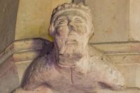 Grotesque head carving