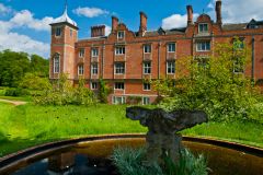 Garden fountain and rear of the house