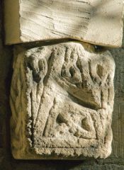 Piece of a Saxon cross shaft over the altar