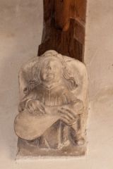 Corbel of a musician