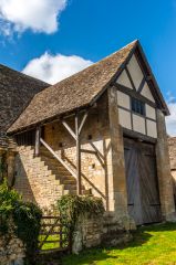 A projecting bay and stairs to the solar
