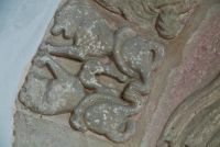 Fighting lions carving