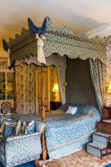 A four-poster bed in the first floor bedrooms