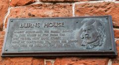 Memorial plaque outside the house