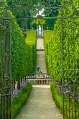 A sloping path from the gardens to the house