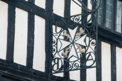 The Templar Cross sign above the door