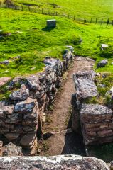 Looking down on the entrance passage from the wall