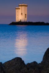 The last light of day hits the lighthouse