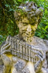 Statue of Pan playing his pipes