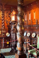 An ornately carved oak pillar