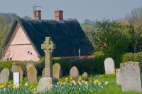 Chediston, St Mary's Church, Thatched cottage from the churchyard