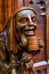 Carved bench end in the quire