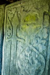 A sword and hounds with foliage decoration