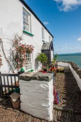 A cobbled patio overlooking the harbour