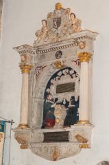 An ornate Jacobean wall monument in the sanctuary