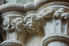 Grotesque face on a column capital