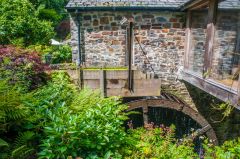 The old mill building and mill wheel