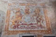 Royal coat of arms, west wall