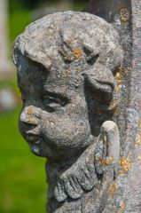 Churchyard cherub carving