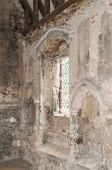 14th century piscinas, south wall