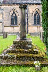 A Saxon cross base in the churchyard