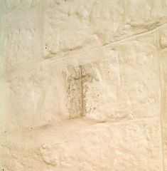 Consecration cross behind the pulpit