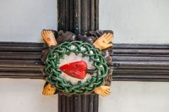 Painted ceiling boss in the porch