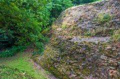 At the base of the castle wall