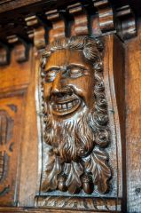 Tucker's Hall, Carved face on the Jacobean panelling
