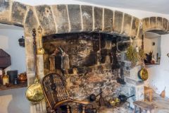 The original kitchen fireplace