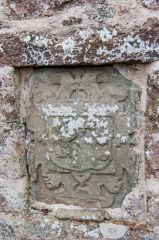 Heraldic coat of arms on the church wall