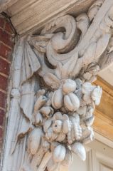 Neoclassical carving on an exterior portico