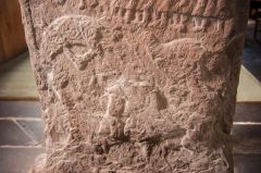 A horse and rider carving