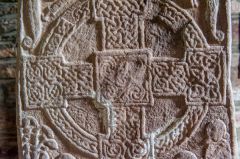 The smaller carved cross