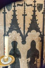 Outline of medieval brasses set on the south chapel wall