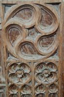 Fressingfield, St Peter & St Paul's Church, Carved bench end - wheel