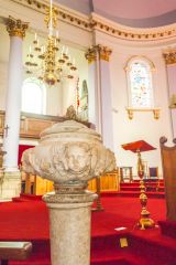 The ornate pedestal font