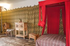 A four-poster bed in the bedchambers