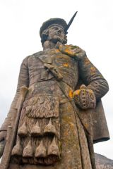 The statue atop the monument