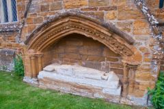 Medieval tomb outside the church