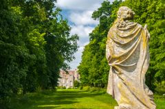 A statue in the woodland gardend