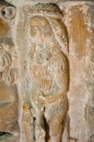 Woodwose on church font